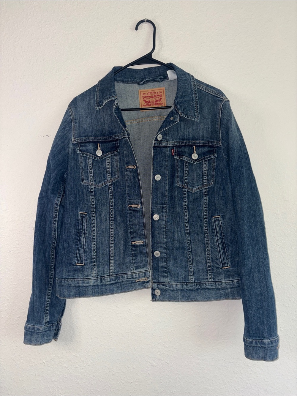 Levi's Light Blue Denim Relaxed Jeans with Tan Patch